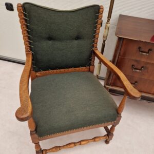 Vintage fauteuil met groene bekleding